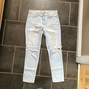 garage ripped skinny blue jeans